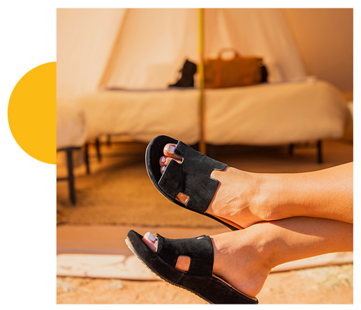 Catiana, a suede wedge slide that's comfortable for lounging or on the go