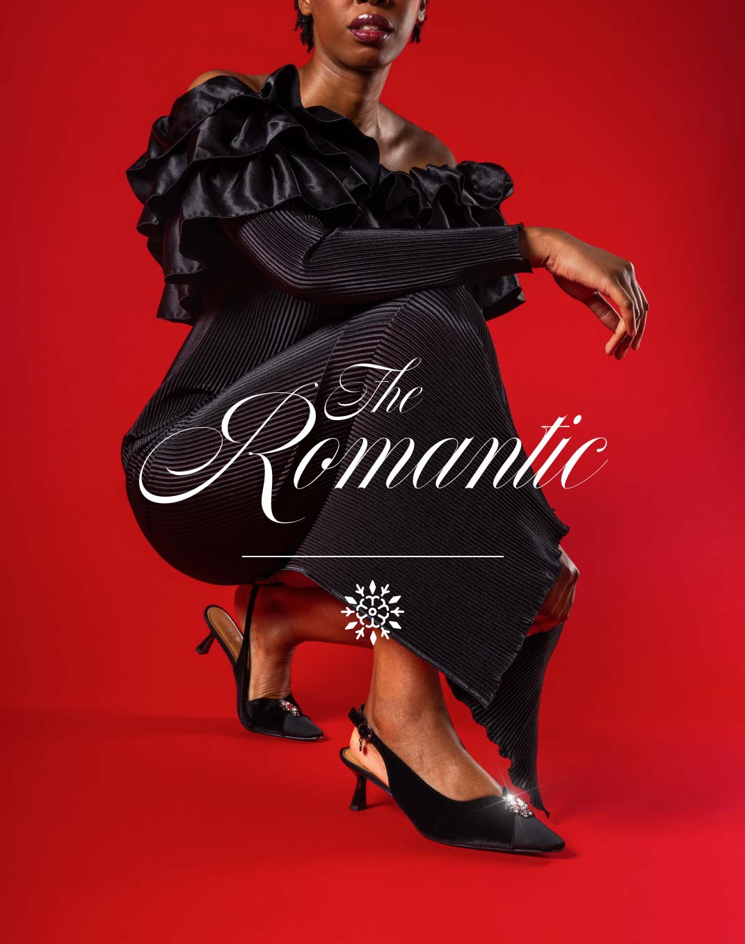 text reads: the romantic image shows a woman against red background in a holiday formal dress and a pointed toe slingback shoe with a crystal ornament