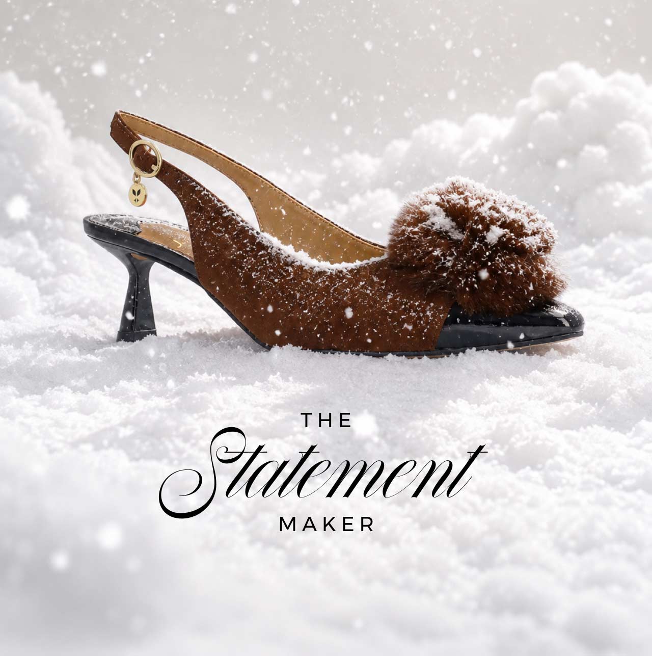 text reads: the statement maker image shows a suede slingback shoe with a fuzzy pom ornament, covered in a dusting of snow